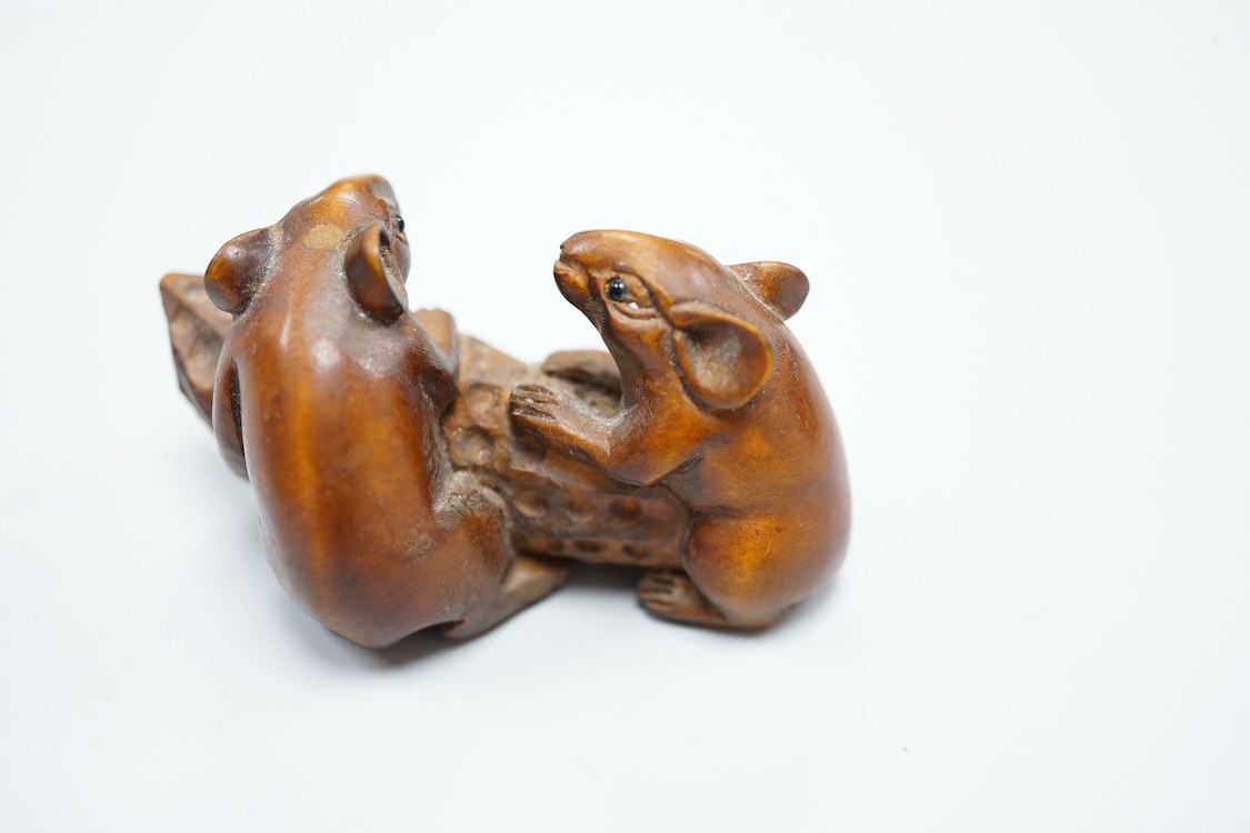 Three carved hardwood netsuke, signed